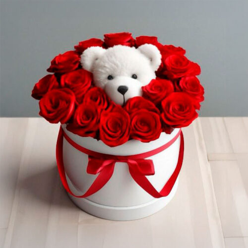 Red roses with a teddy bear