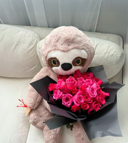 Bouquet of roses with teddy bear