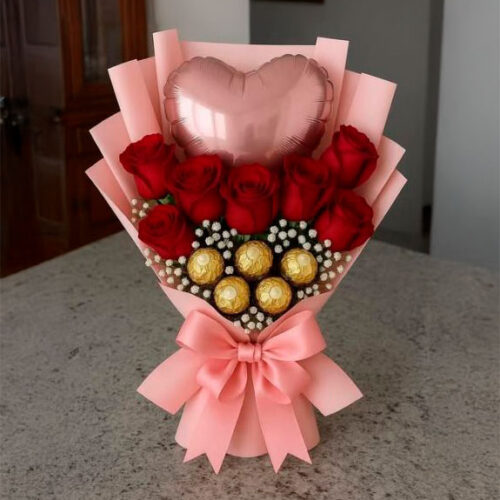 Bouquet of red roses with chocolate